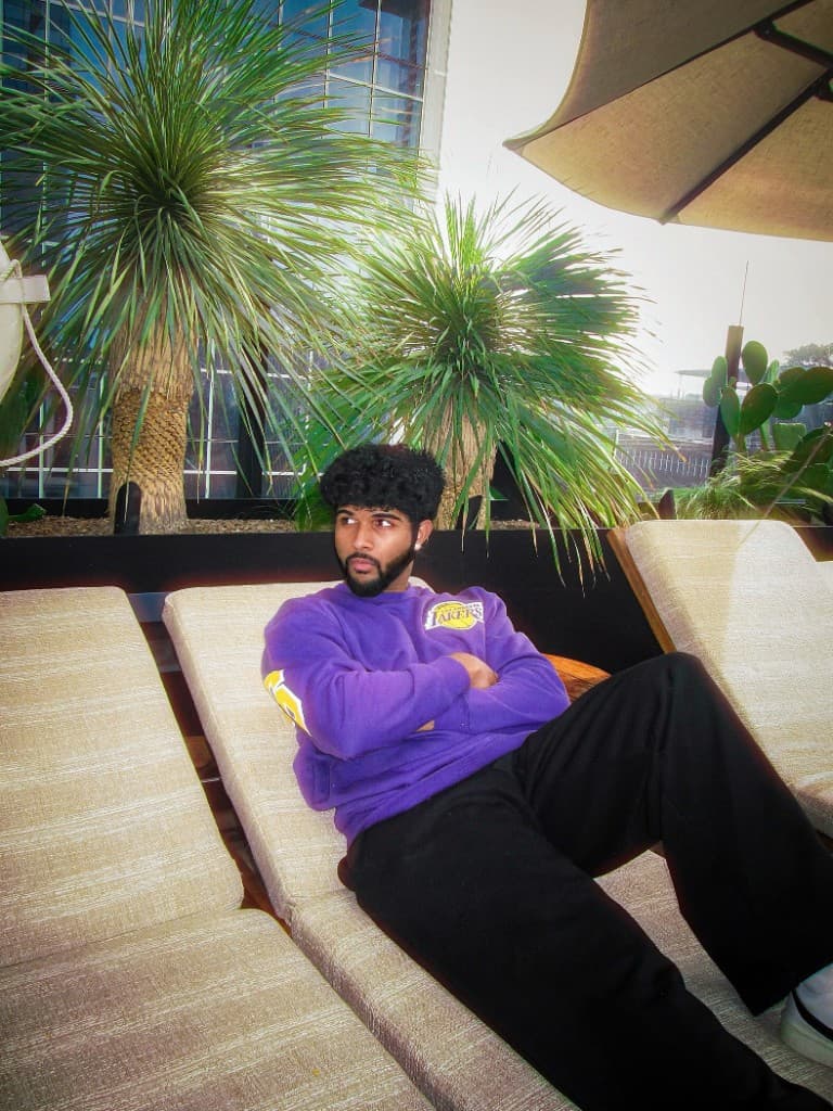 Dhruv Hegde — relaxed portrait, CS student at University of Michigan
